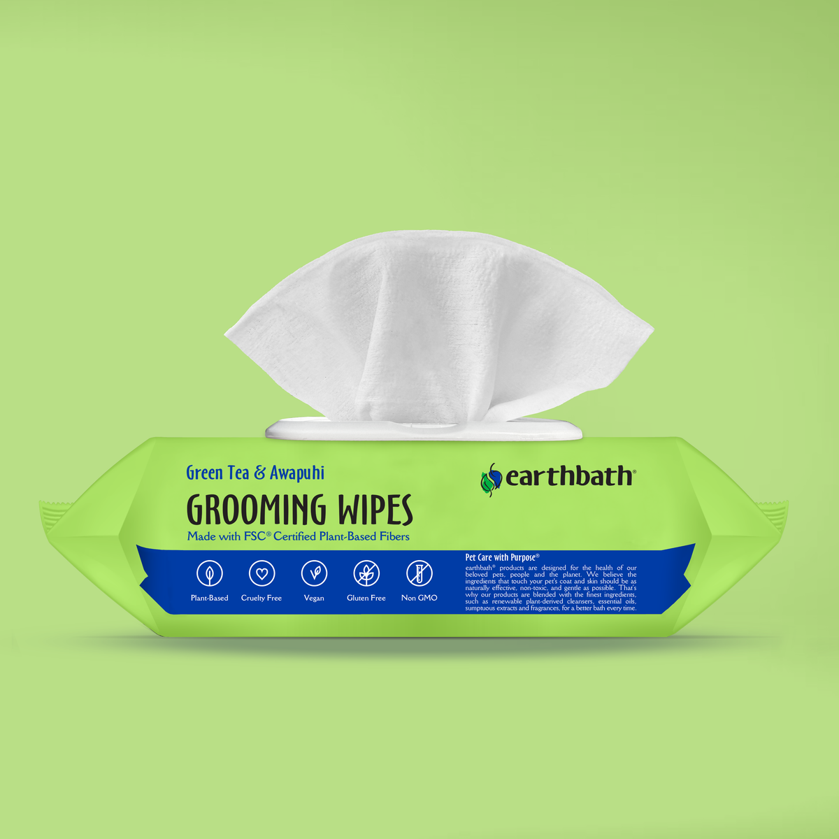 Pack of Earthbath grooming wipes on a green background