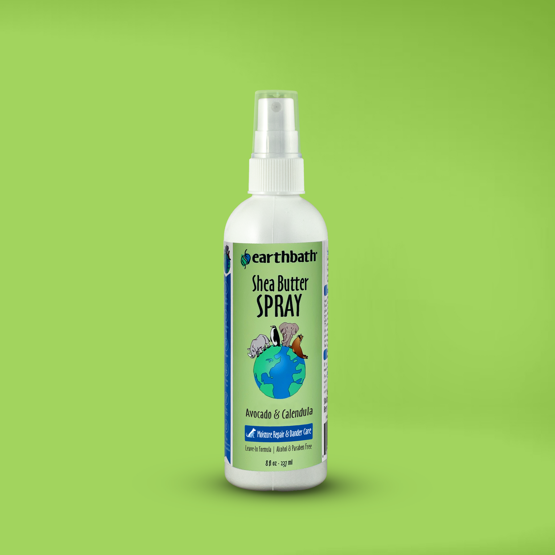 A bottle of earthbath Shea Butter Spray for pets, with a label featuring a green paw and leaf design with green background.